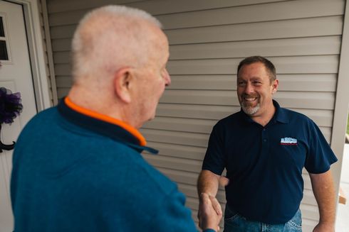 two men shaking hands
