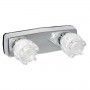 A close up of a shower head with two handles on a white background.