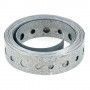A roll of metal tape with holes in it on a white background.