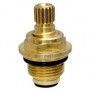 A close up of a brass valve on a white background.