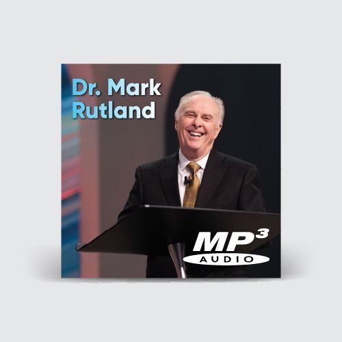 Dr. Mark Rutland, smiling, at a podium. The audio CD cover features a photo. MP3 Audio label.
