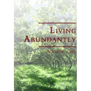 Book cover: "Living Abundantly" title in dark red text over a blurred green, outdoor scene.