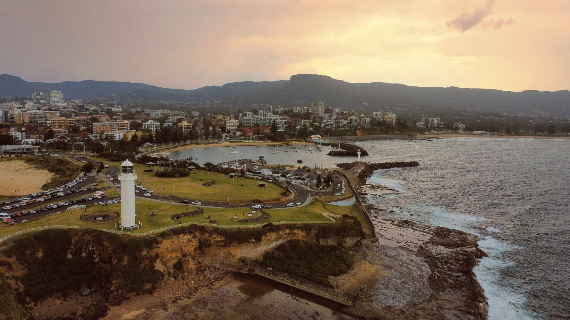 Aerial view of Wollongong suburbs and coastline.