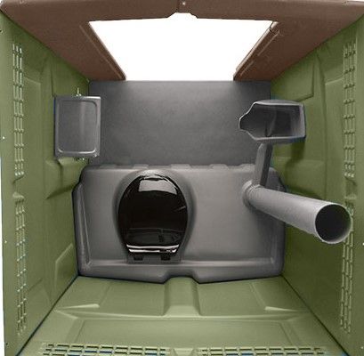 Interior of a green and gray portable toilet. Features a toilet bowl, urinal, and ventilation.