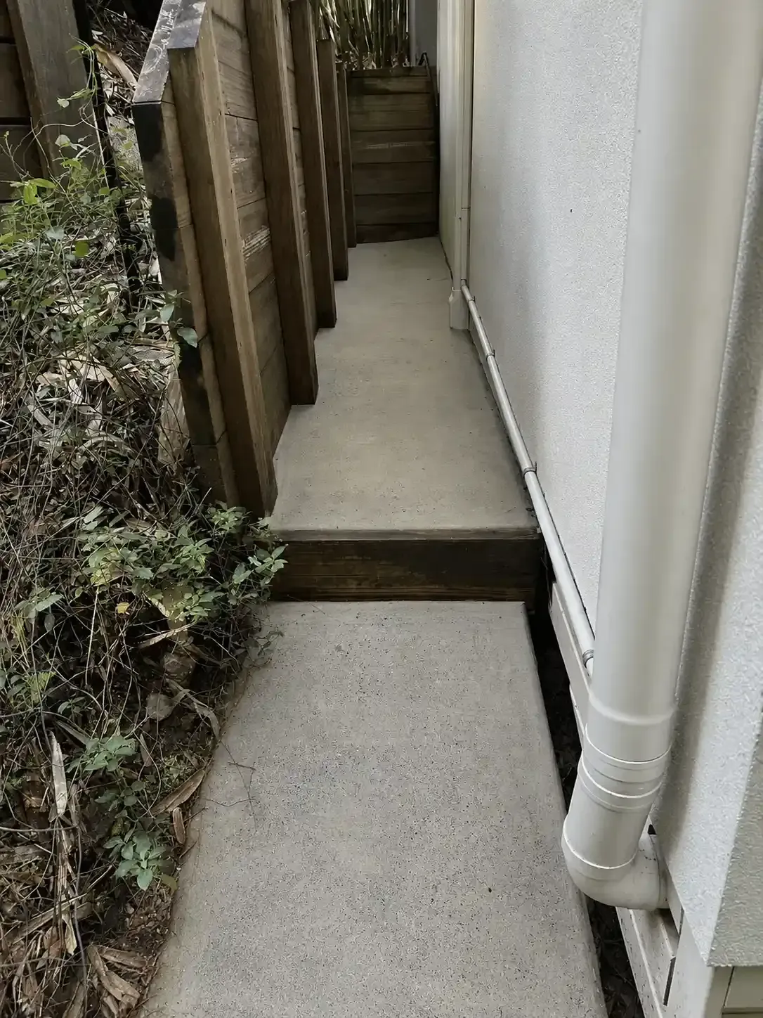 Narrow concrete side path after pressure cleaning in Mansfield, Brisbane