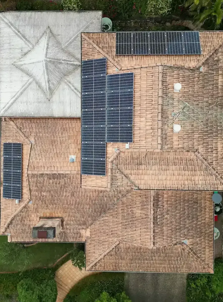 Dull, lichen-stained terracotta tile roof before soft wash roof cleaning in Mount Gravatt East, Brisbane