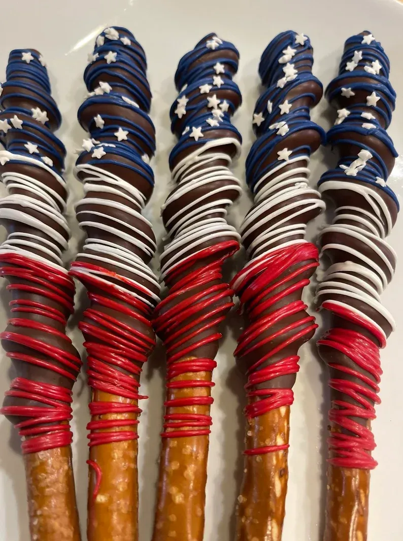 Rows of stacked beaded bracelets in blue, white, red, and gold tones