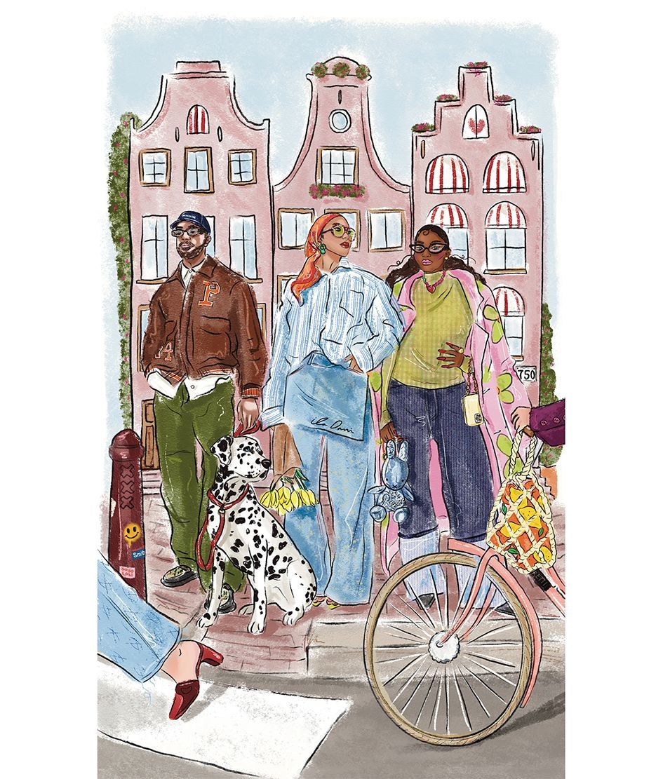 Three people with a Dalmatian dog in front of pink buildings. One rides a bicycle.