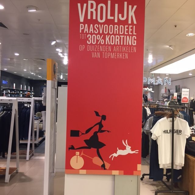 Red sale sign in store: 