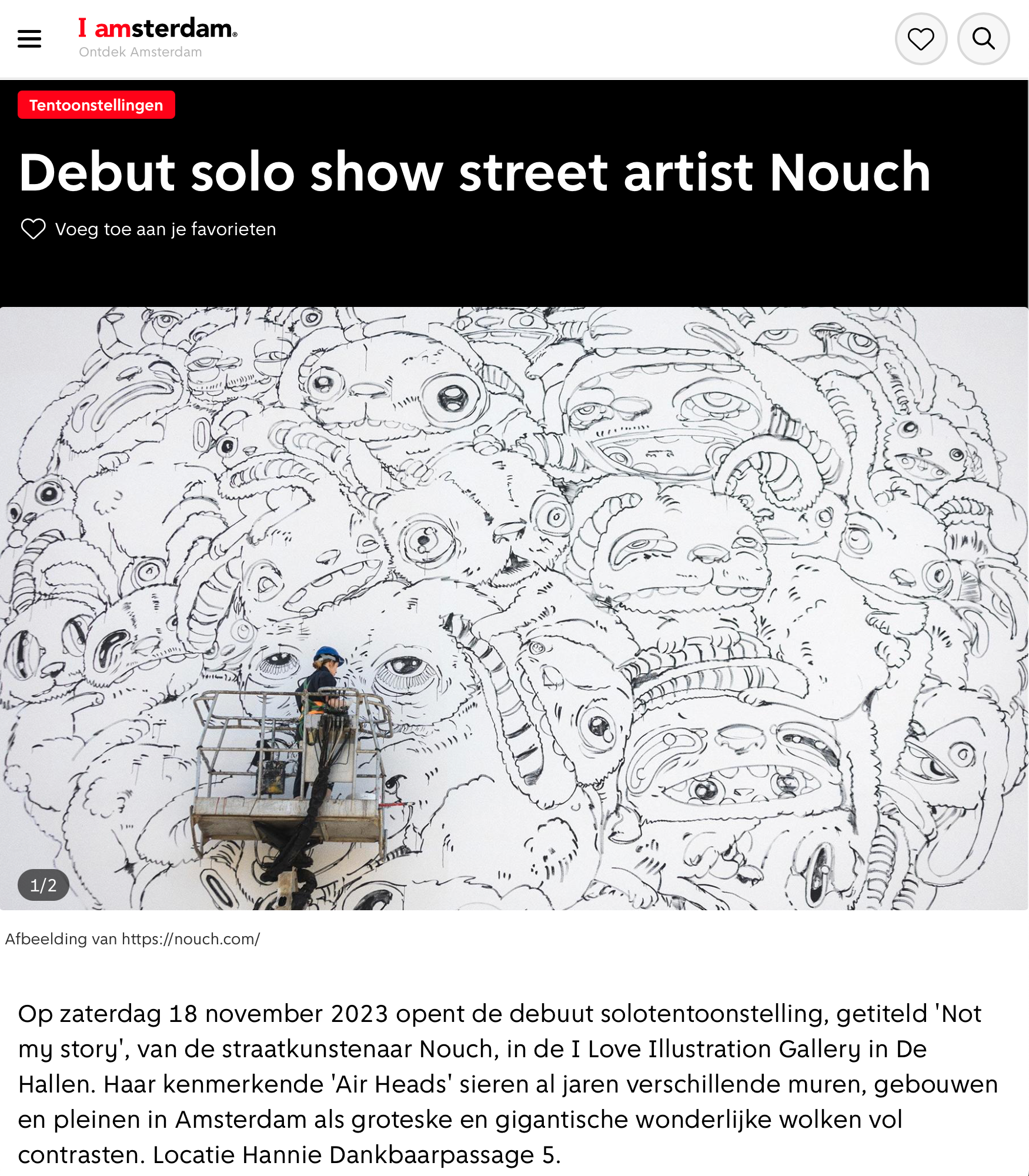 Street artist Nouch working on a large, intricate black and white mural.