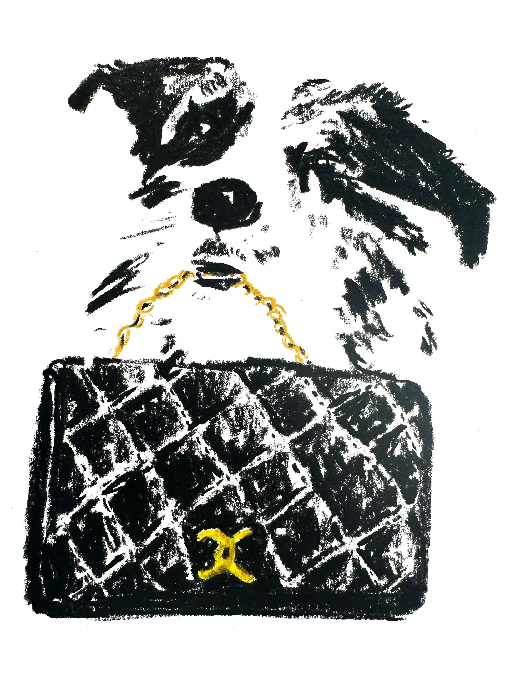 Dog's face with a black quilted handbag with a gold chain strap.