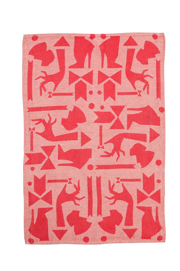 Red and pink patterned textile with geometric shapes and stylized animal figures.