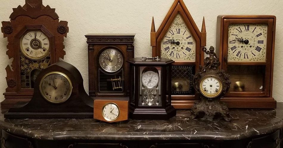 A close up of the inside of a clock with gears