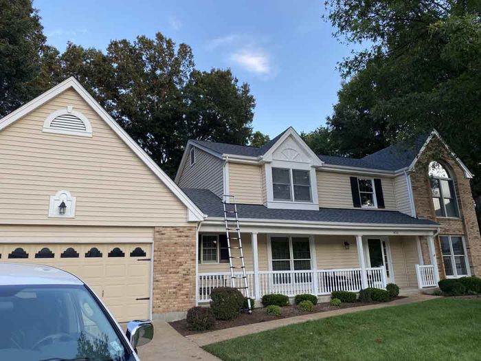 house with shingle roof