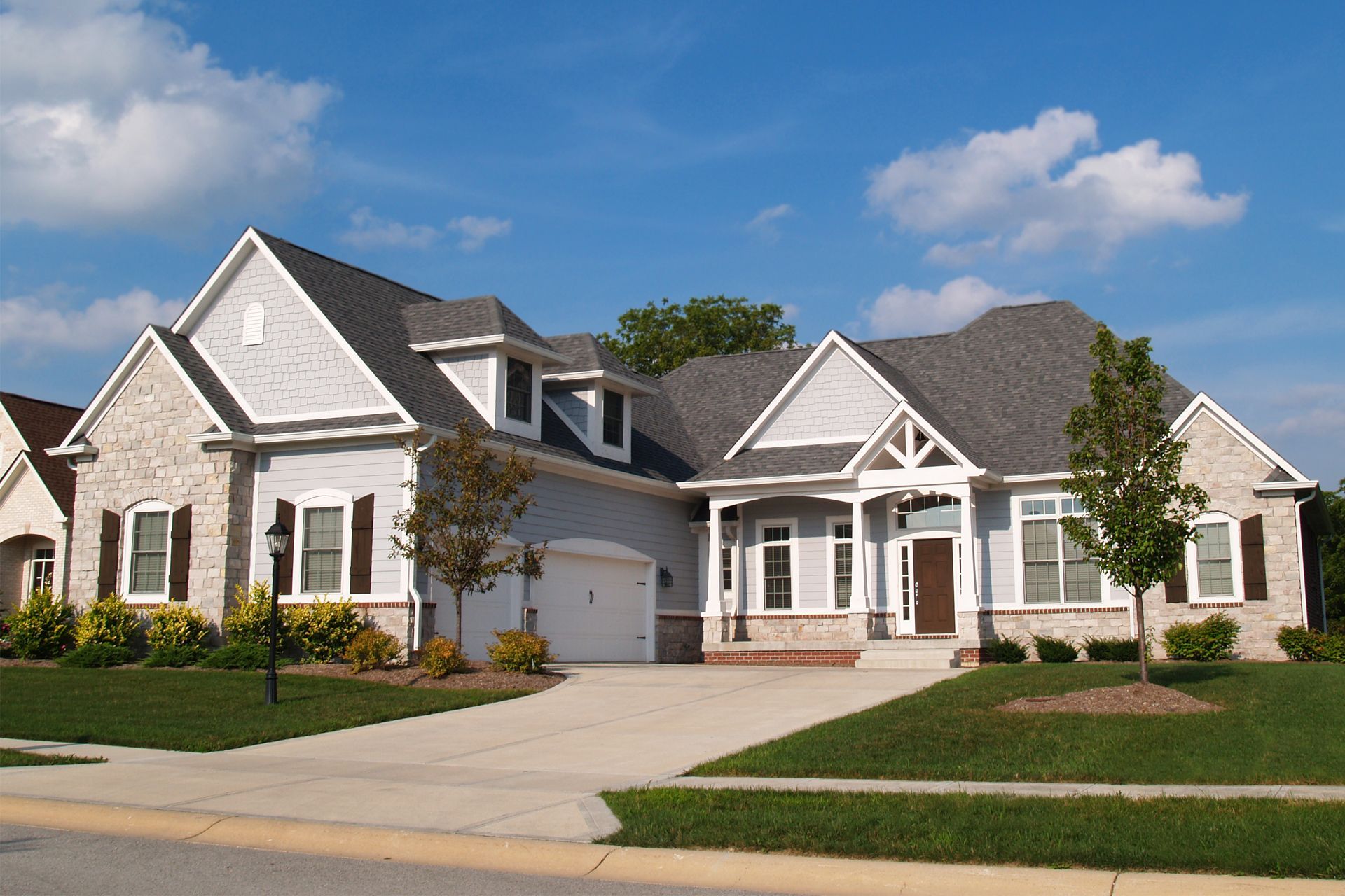 residential house with shingle roof