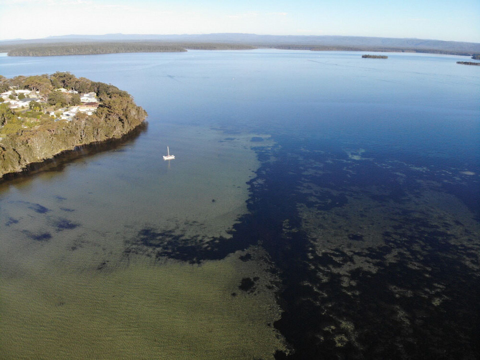 An Aerial View of A Large Body of Water — BVN Landscape and Concrete Supplies in St Georges Basin, NSW