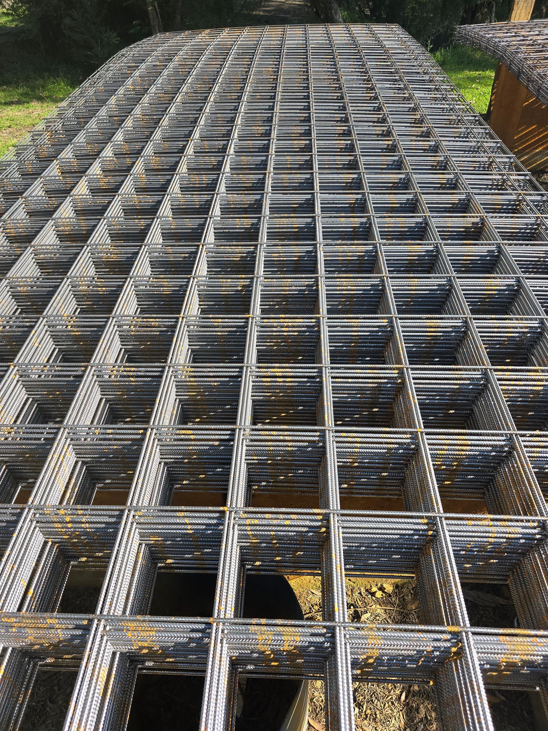 Metal Reinforcing Mesh Laid Out on a Surface — BVN Landscape and Concrete Supplies in St Georges Basin, NSW