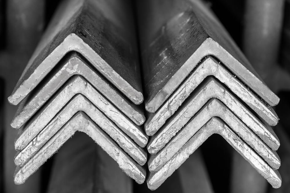 A Black and White Photo of A Stack of Metal Angles — BVN Landscape and Concrete Supplies in Vincentia, NSW