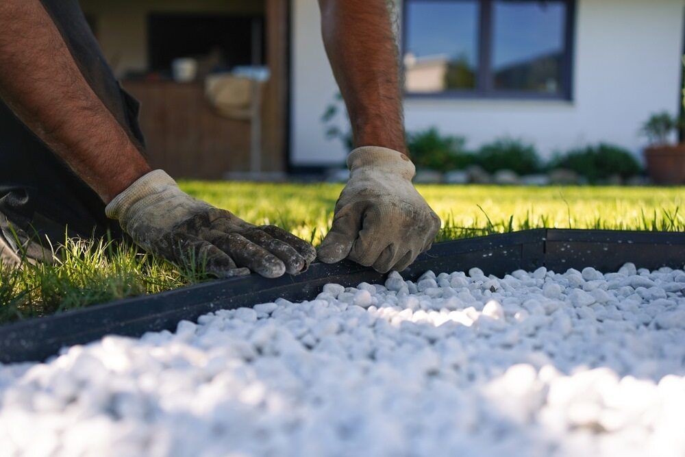 Close up of landscaper at work.