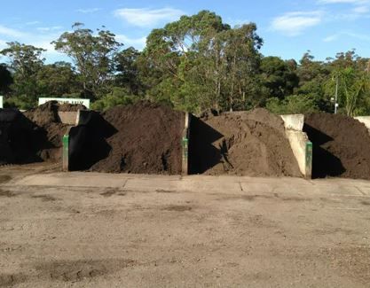 A Pile of Dirt with Trees in The Background — BVN Landscape and Concrete Supplies in Nowra, NSW