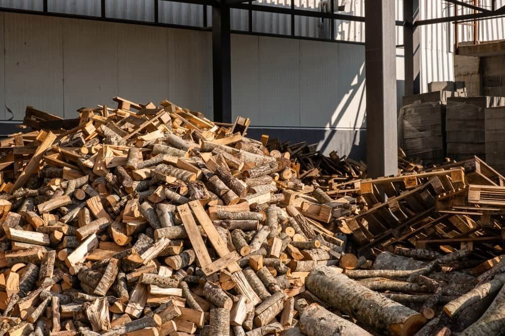 Pile of Chopped Firewood and Logs Stacked — BVN Landscape and Concrete Supplies in St Georges Basin, NSW