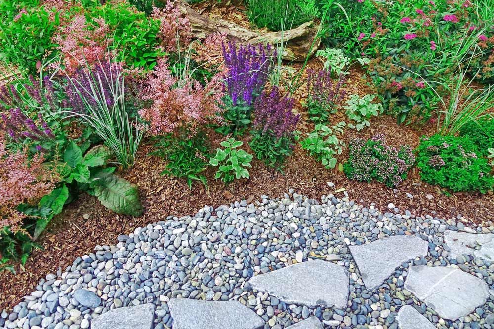 Garden With Decorative Gravels — BVN Landscape and Concrete Supplies in St Georges Basin, NSW