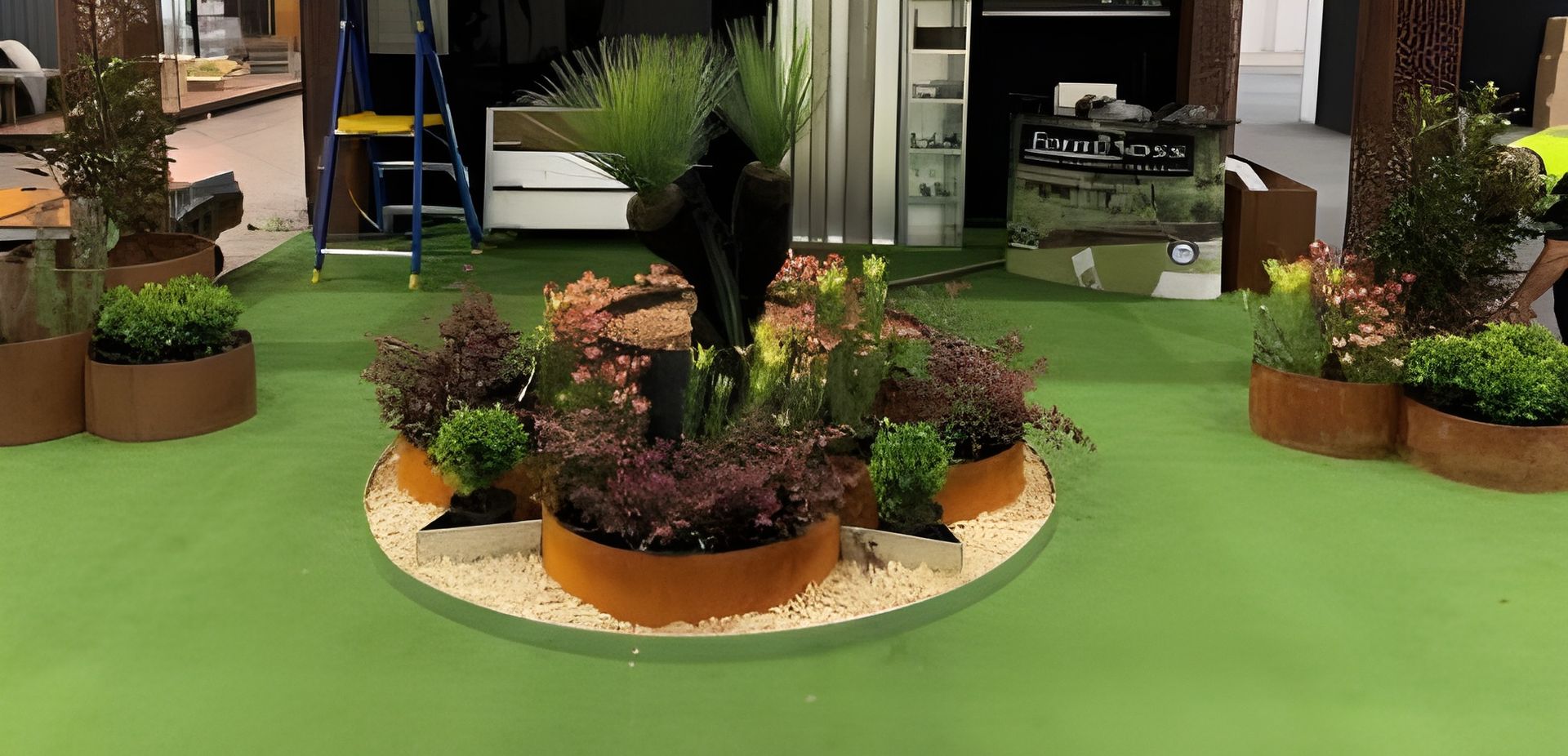A Indoor Planter Display Featuring Various Green Shrubs and Grasses — BVN Landscape and Concrete Supplies in Nowra, NSW