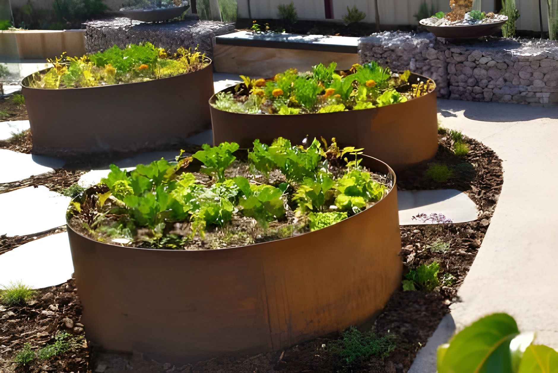 Three Circular, Rusted Metal Garden Planters Filled — BVN Landscape and Concrete Supplies in St Georges Basin, NSW