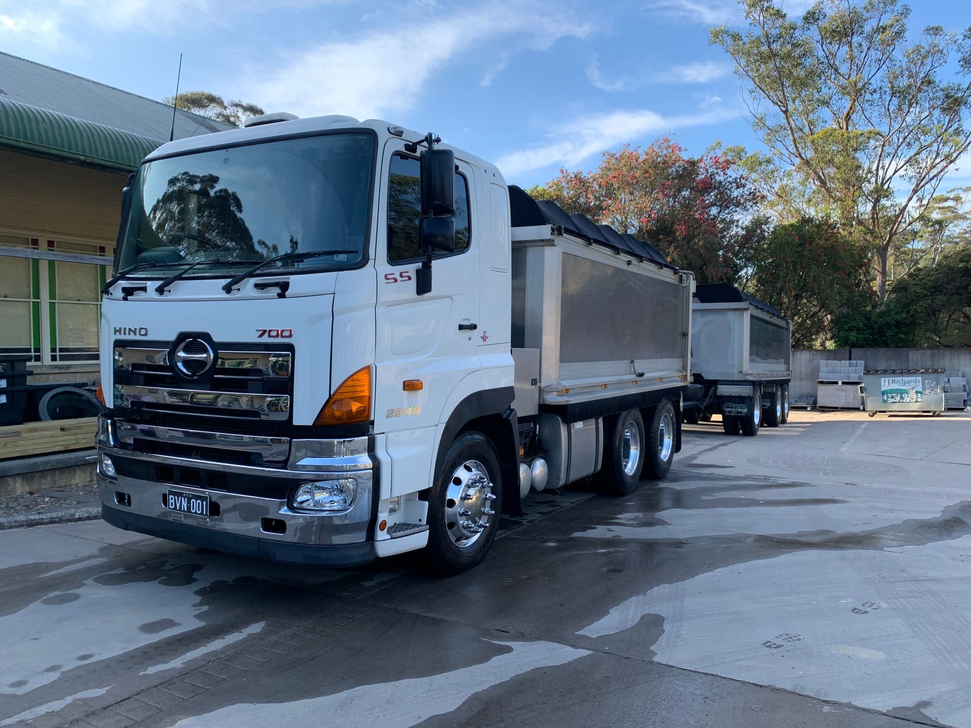 White Hino Truck With a Trailer, Parked Outdoors — BVN Landscape and Concrete Supplies in St Georges Basin, NSW