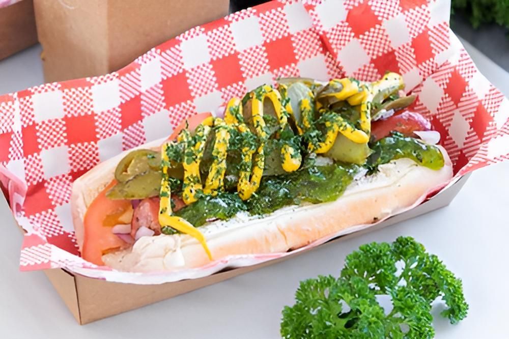 A Hot Dog With Mustard And Pickles On A Bun — Noosaville Fish Market In Tewantin, QLD
