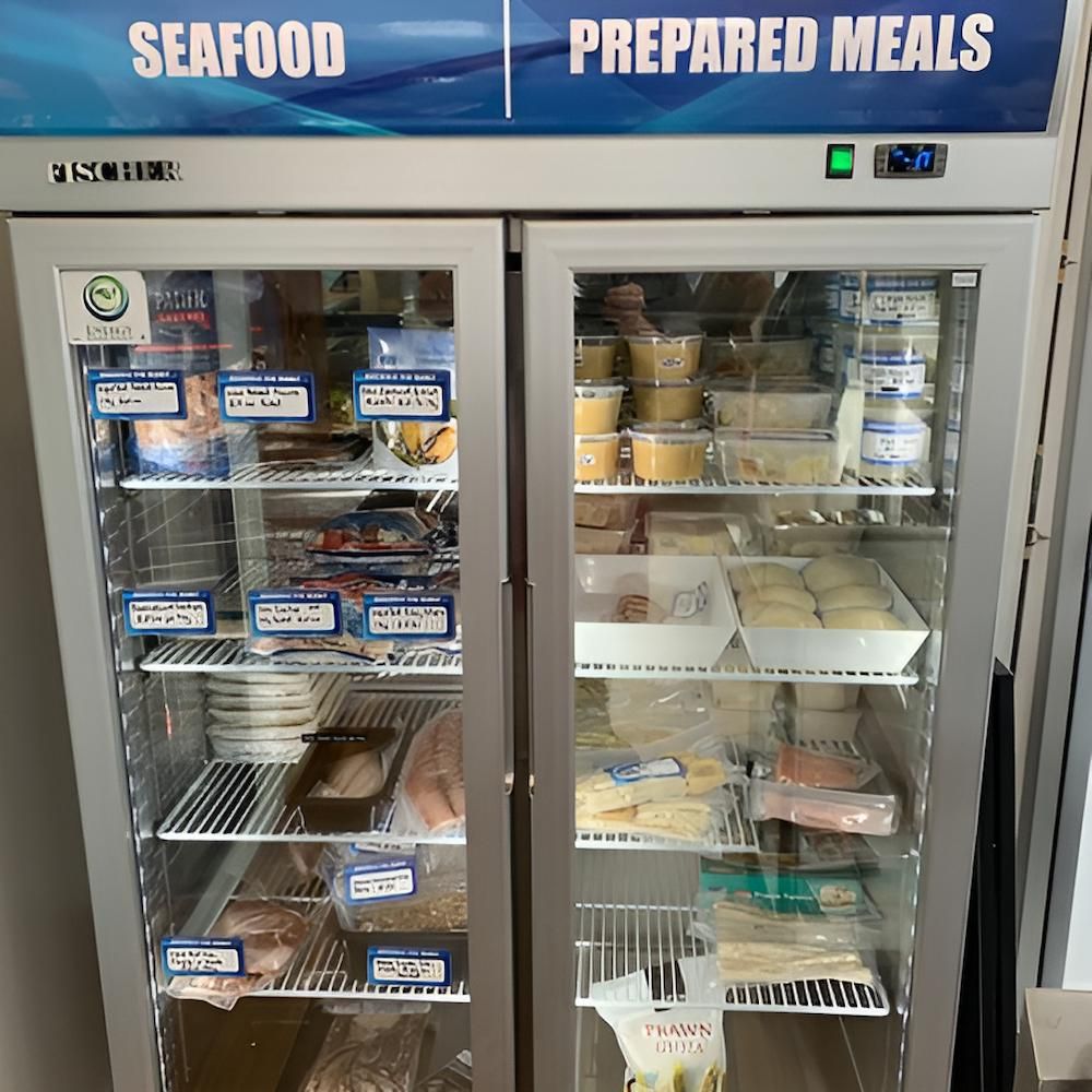 A Refrigerator Filled With Seafood And Prepared Meals — Noosaville Fish Market In Tewantin, QLD