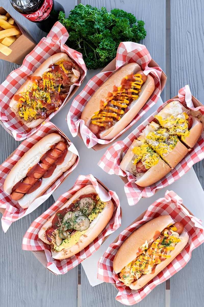 There Are Many Different Types Of Hot Dogs On The Table — Noosaville Fish Market In Tewantin, QLD