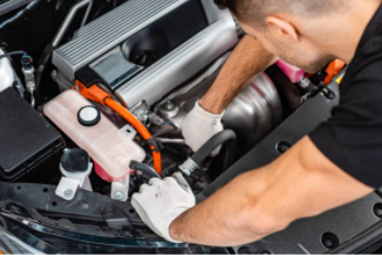 Mobile mechanic inspecting vehicle engine in Cheyenne, WY