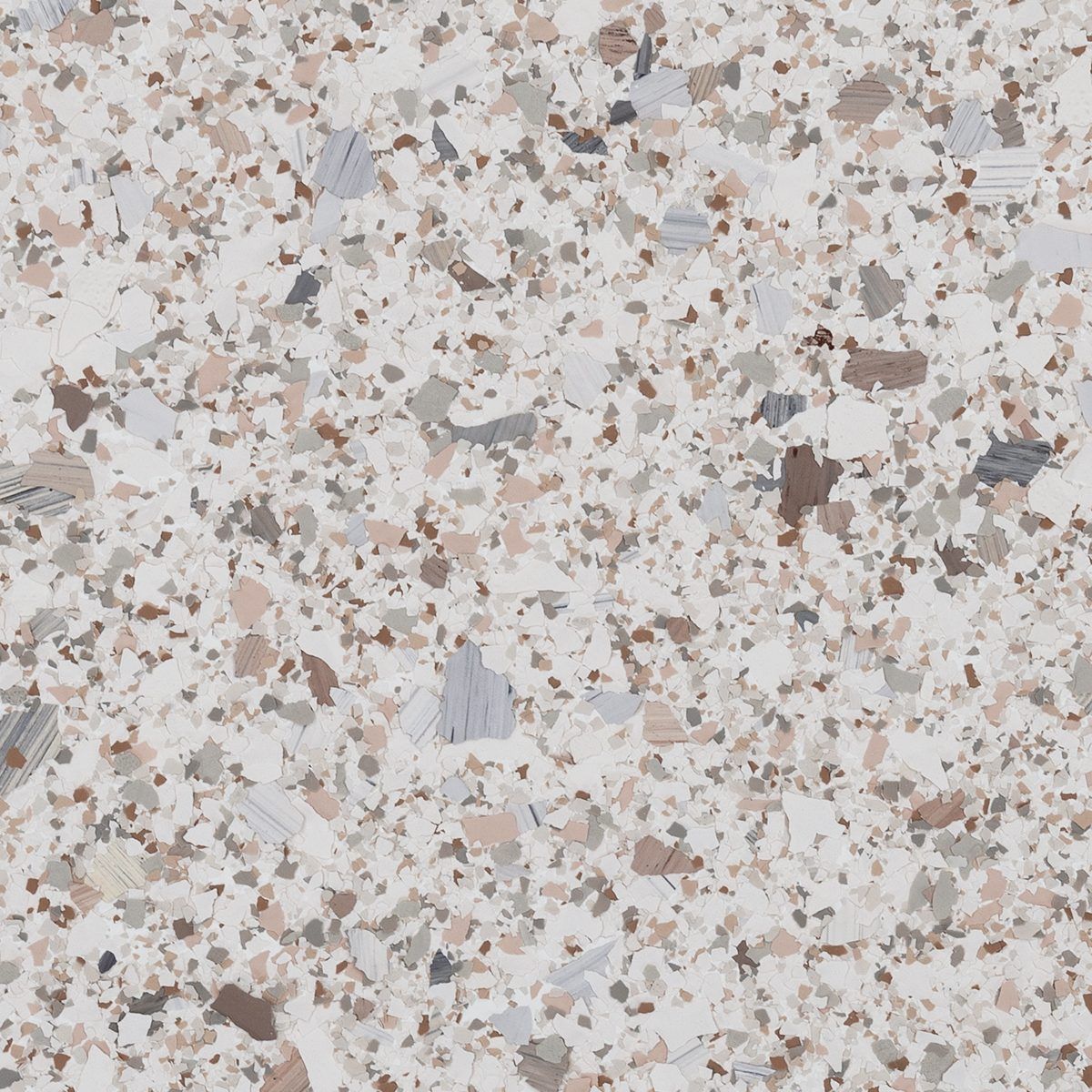 Close-up of speckled terrazzo surface in white, beige, gray, and brown tones
