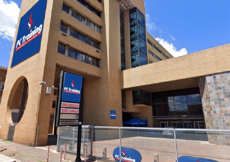 A large building with a sign that says k training