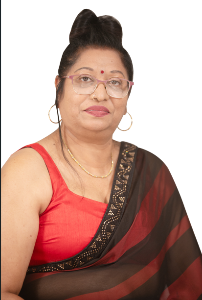 A woman wearing glasses and a red top is standing in front of a white background.