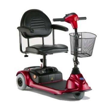 A red mobility scooter with a basket attached to it.
