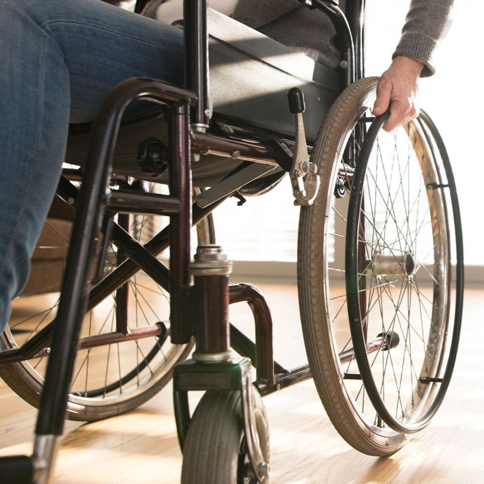 A person relaxes in a comfortable electric lift chair rental.
