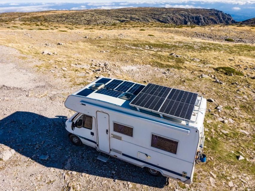 A Solar Panel Is Sitting On Top Of A Trailer — Lake Macquarie Caravan Repairs In Cardiff, NSW