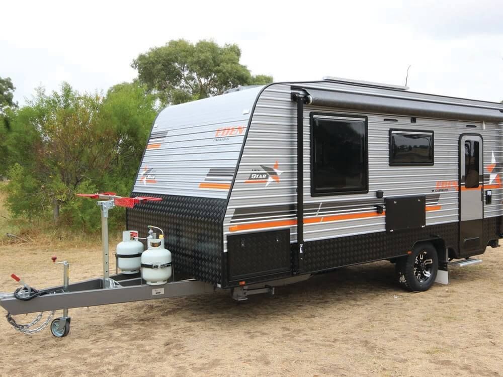 A Motorhome On A Dirt Road — Lake Macquarie Caravan Repairs In Wyong, NSW