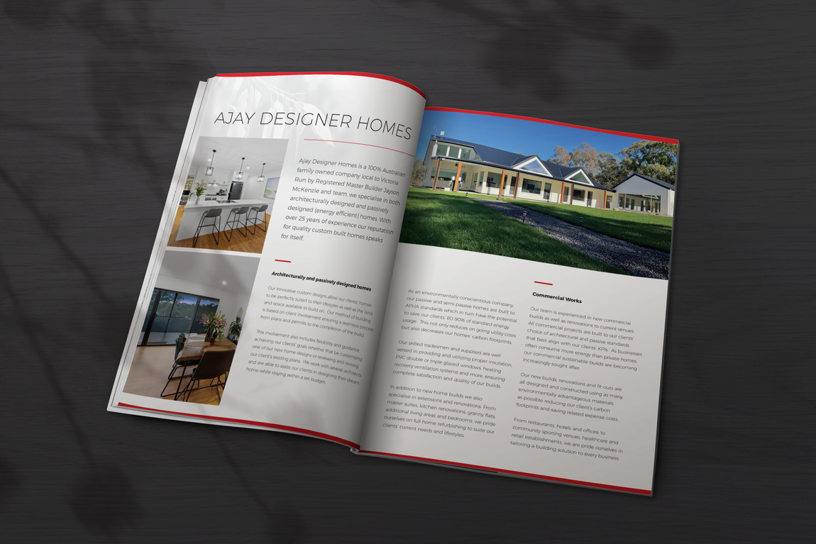 Open magazine with photos of home interiors and exteriors; text on white pages with red border.