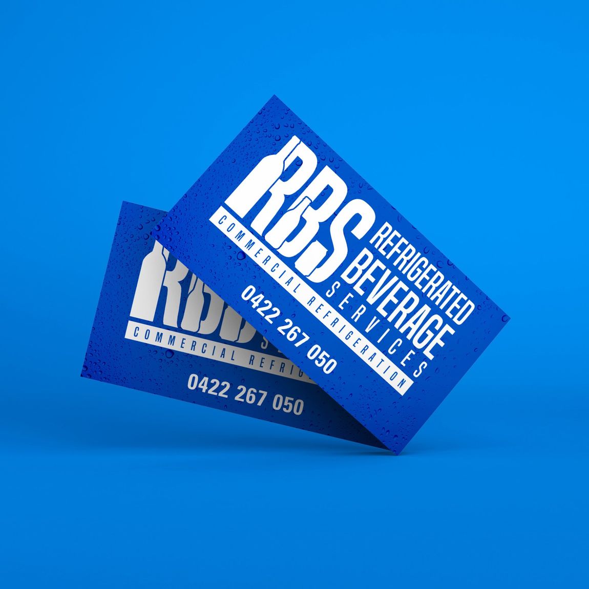 Blue business cards for “RBS Refrigeration & Beverage Service” on a blue background.