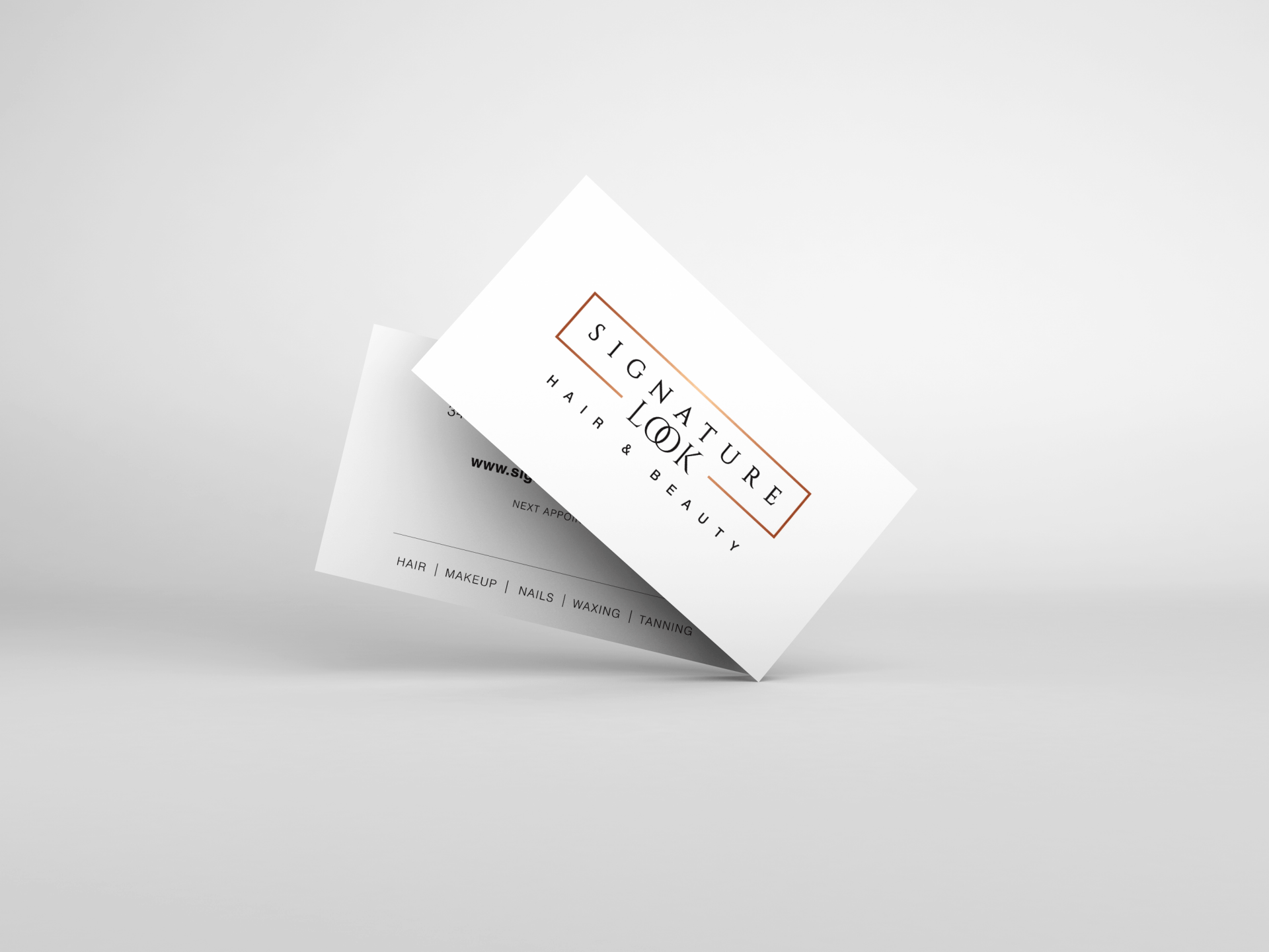 Business cards: pile with a photo of a spa treatment and a card with rose-gold cursive