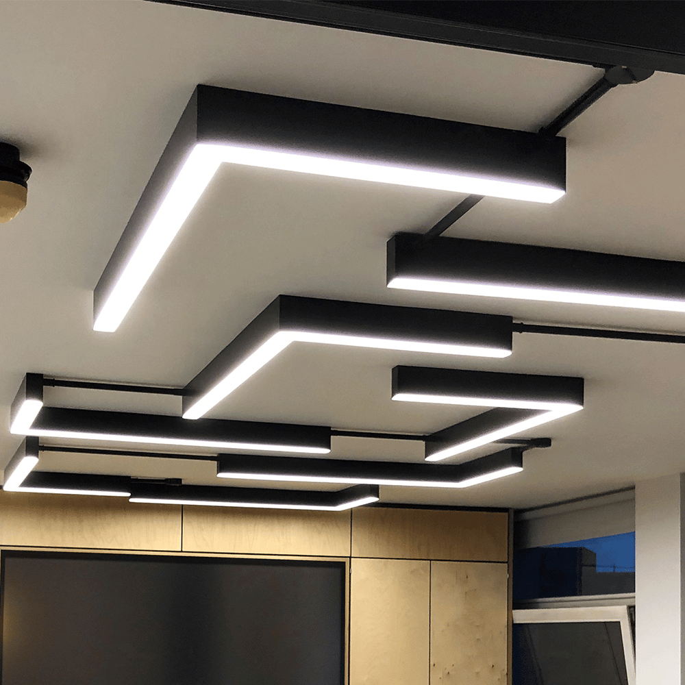 A room with a lot of lights on the ceiling