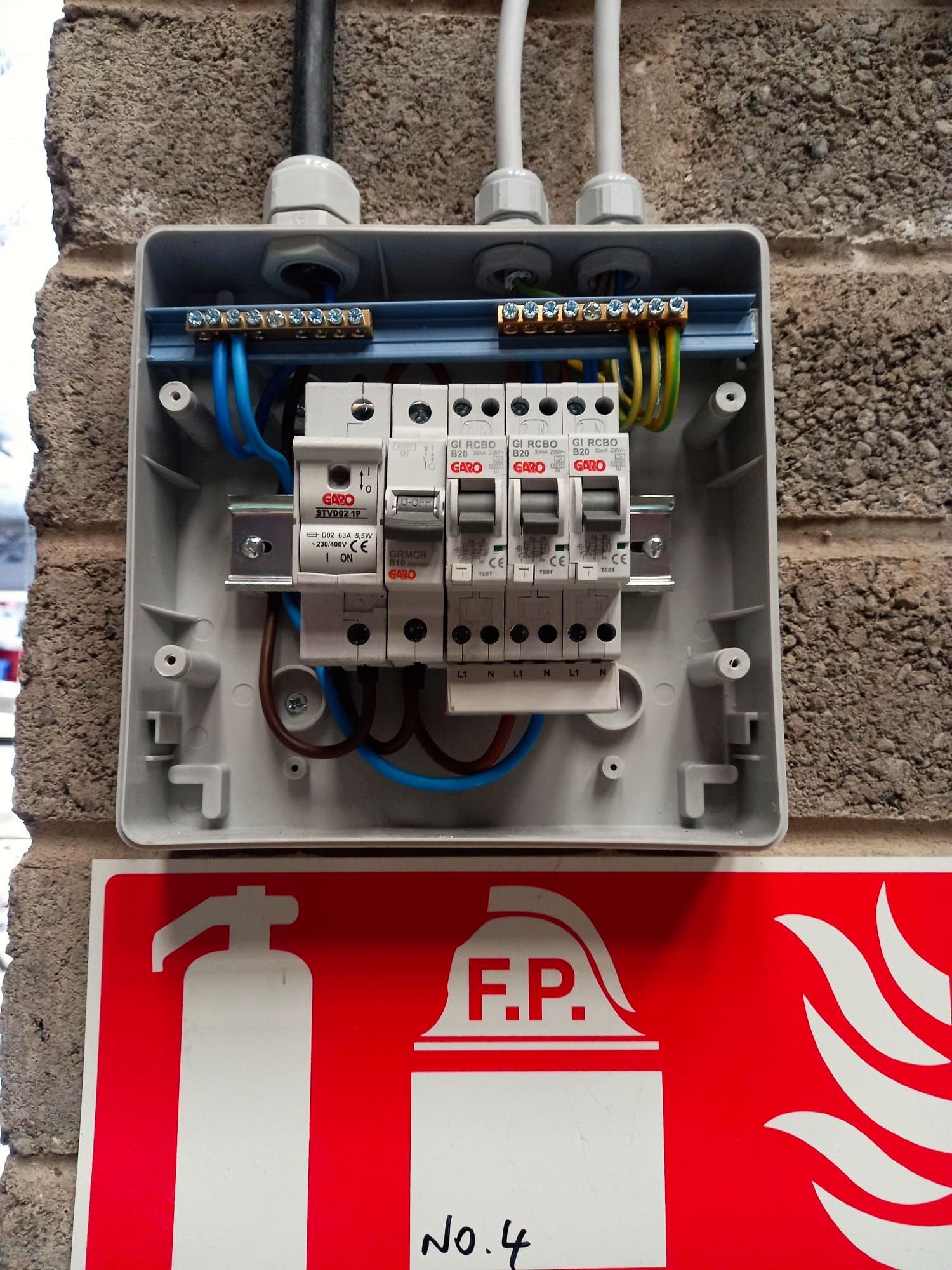 A fire extinguisher with the letter f.p. on it