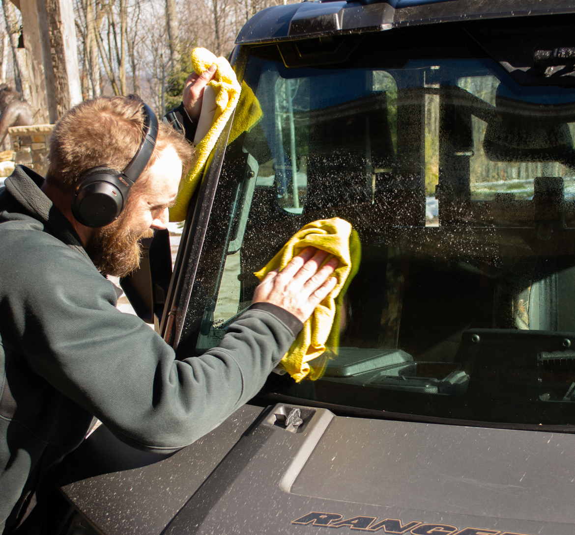 washing windshield of UTV