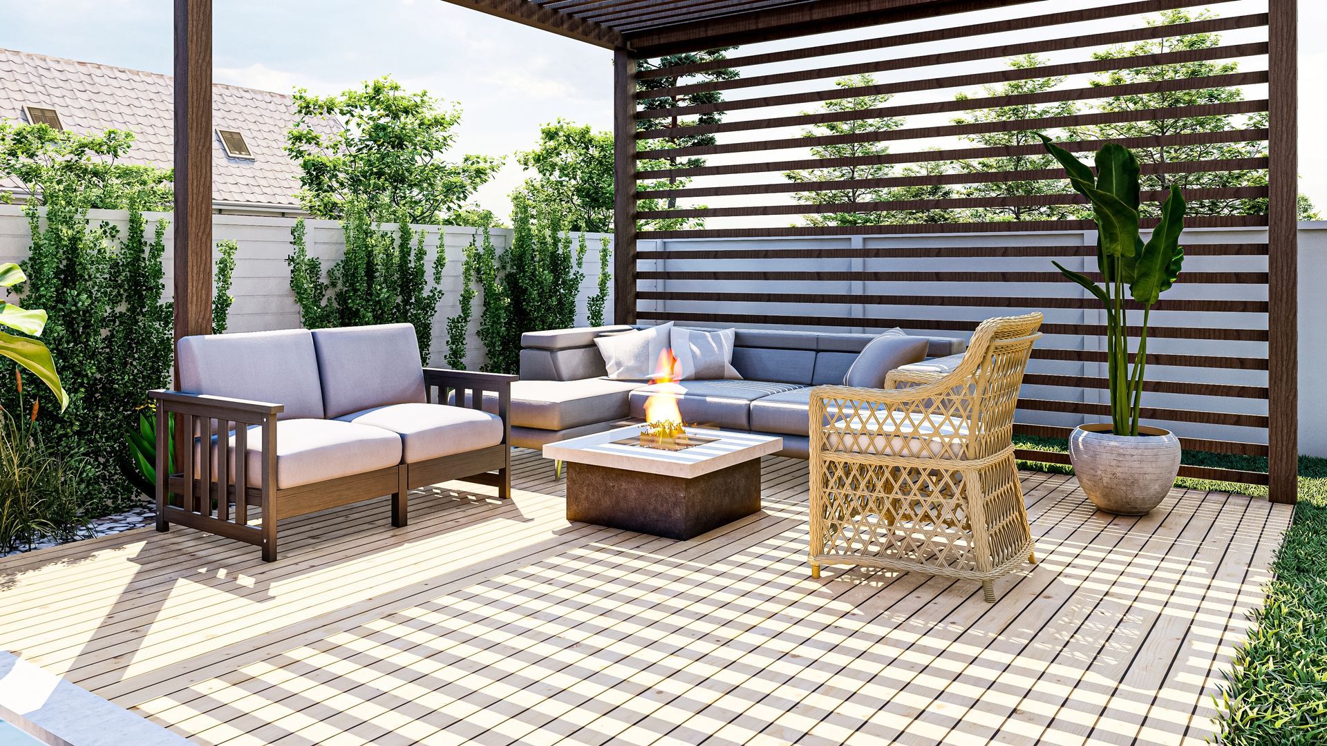 there is a fire pit on the patio with chairs around it .