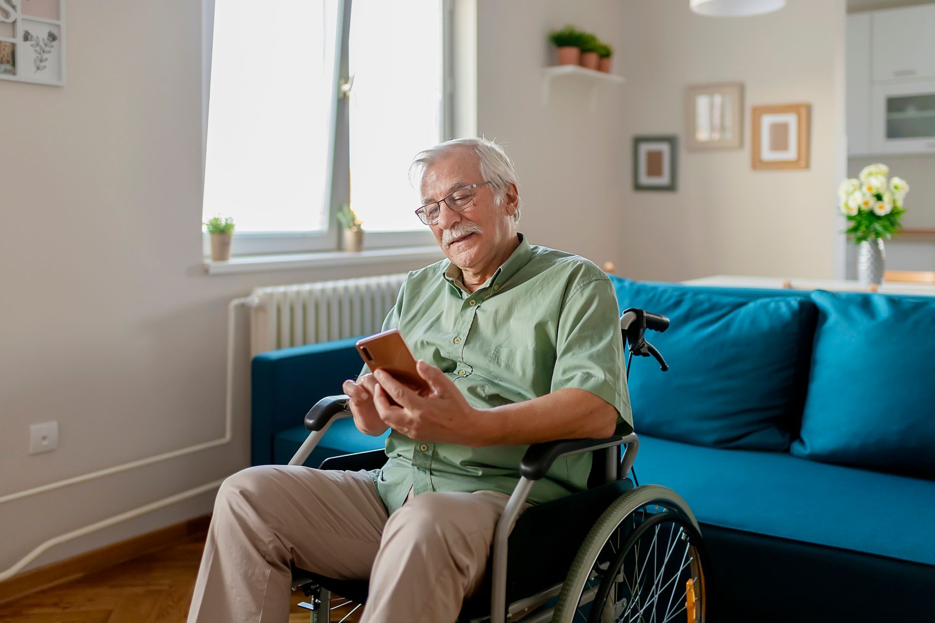 Senior Man Sitting in a Wheelchair — Campbelltown, NSW — Gorman Jones Lawyers