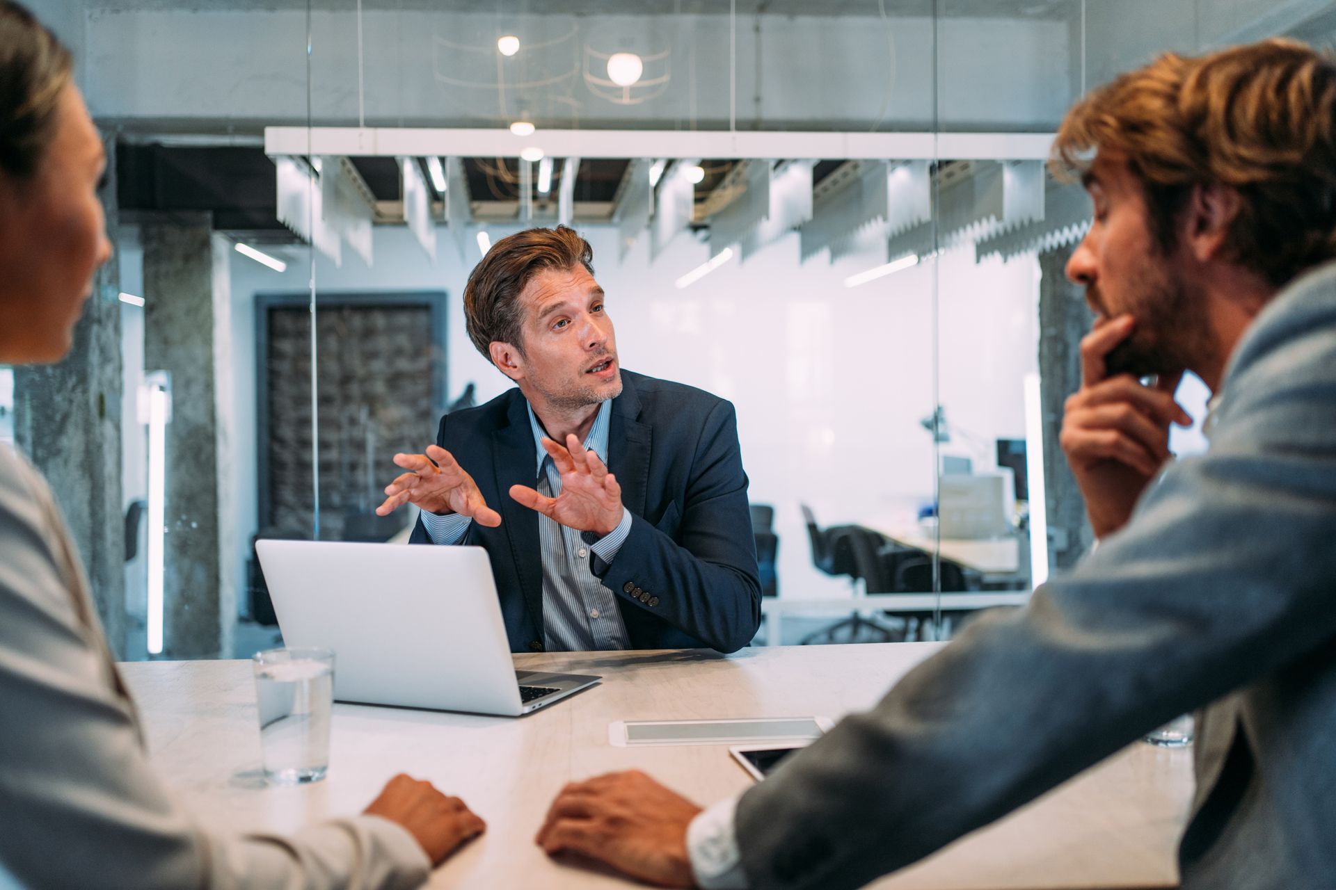 Lawyer Talking to Two Businessmen — Campbelltown, NSW — Gorman Jones Lawyers
