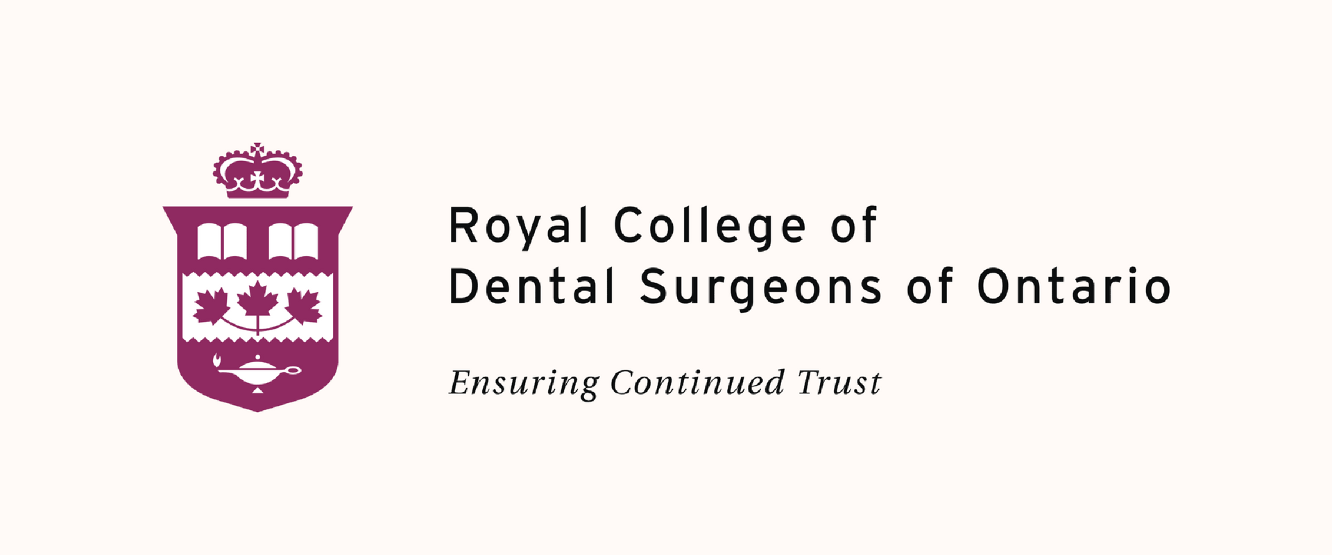 Logo of the Royal College of Dental Surgeons of Ontario. Burgundy crest with crown and Canadian maple leaves.